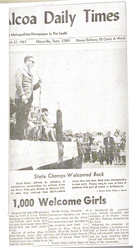 Photo of Alcoa Daily Times article from 1967. Headline: 1,000 Welcome Girls. Photo shows Coach Galen Johnson speaking to crowd. Caption of photo: State Champs Welcomed Back. Date: March 27, 1967.
