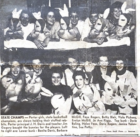 B&W newspaper photo of the 1959 State Champs. Porter HS Girls Basketball Team holding stuffed bunnies given to them by the Principal and Teacher.