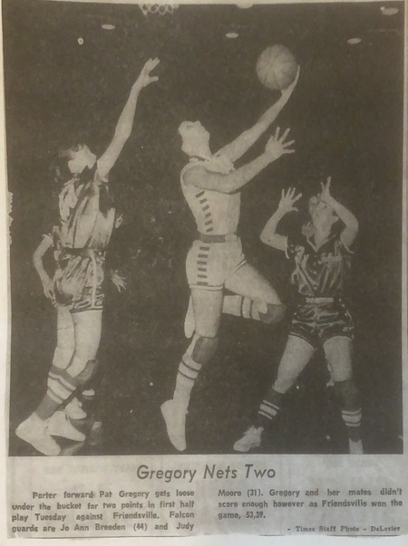 B&W newspaper game photo of Porter forward Pat Gregory shooting a hook shot.