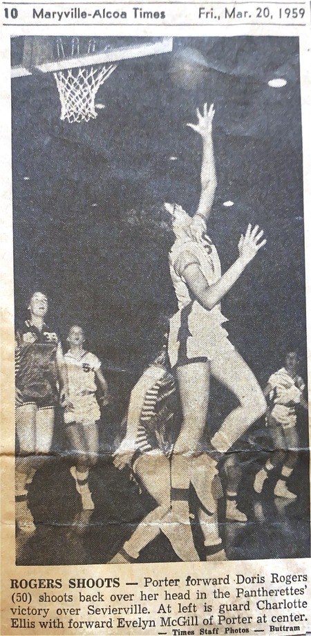 B&W newspaper game photo of Porter forward Doris Rogers shooting a hook shot. 1959.